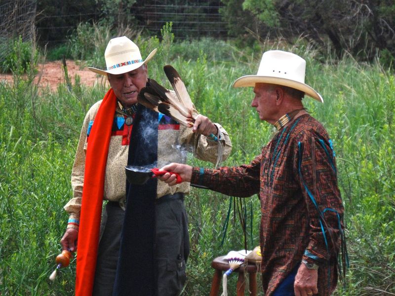 Don Parker and Glenn Leming performing a cedar blessing ceremony