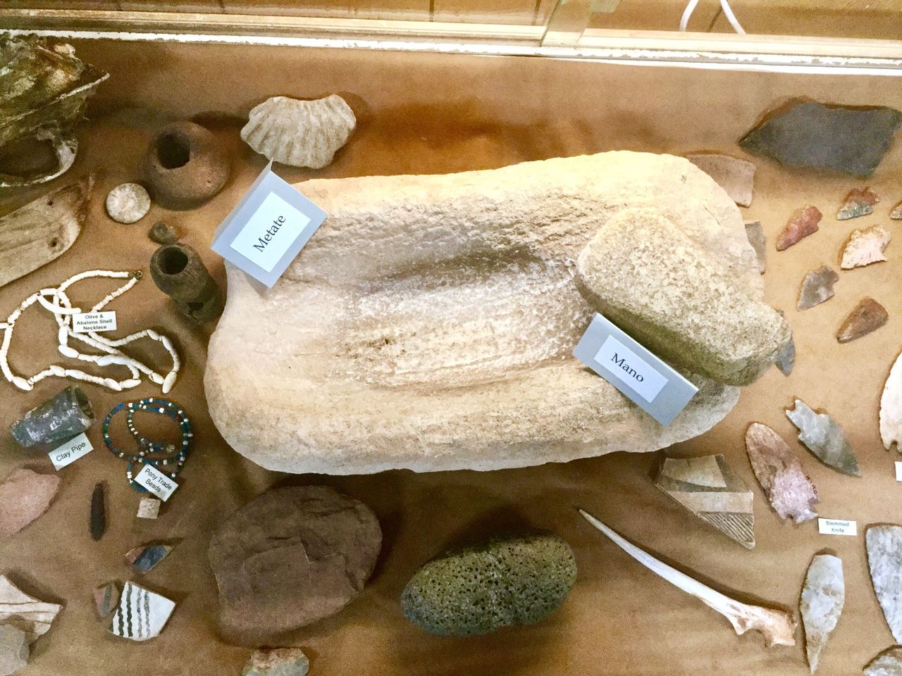 Stone mano & metate, used for grinding corn.